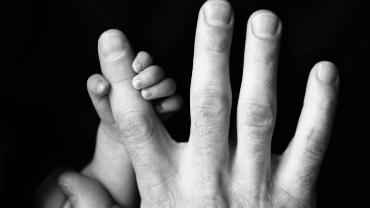 man and child hands