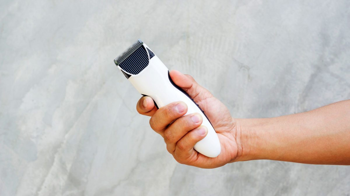 a man holding a razor