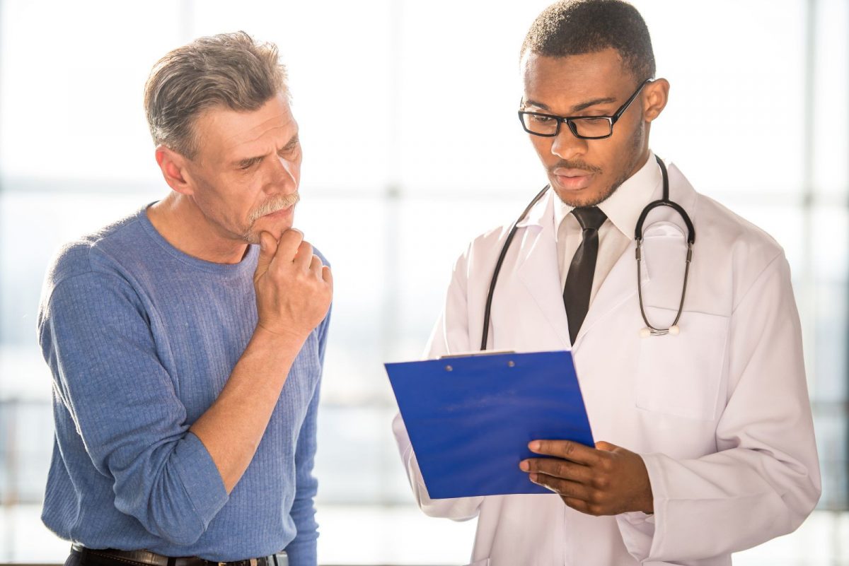 a man consulting with his doctor