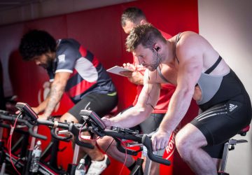 men in a spin class