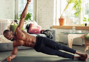 a man doing a side plank