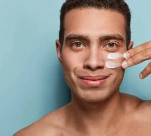 a man adding moisturizer