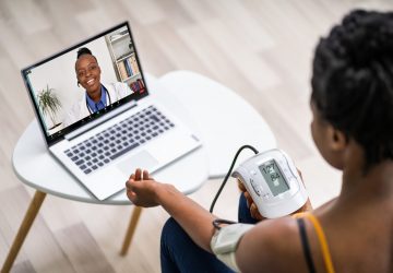 a woman at a virtual health care appointment.