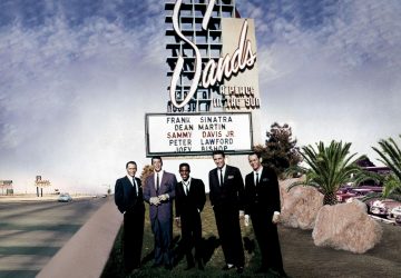 the rat pack standing in front of the sand's hotel sign in las vegas